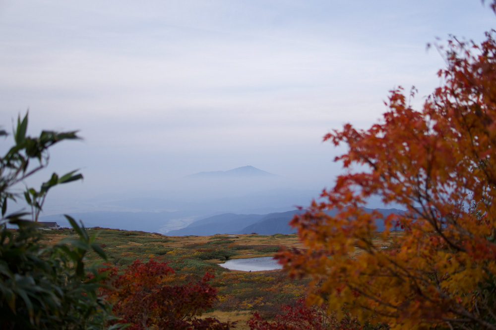 Mt. Chokai amongst the autumn leaves seen from Mt. Gassan of the Dewa Sanzan