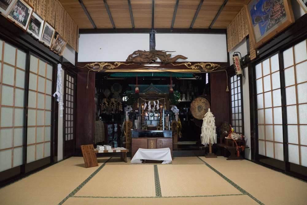 The Shinto Shrine and Buddhist Altar of Daishinbo Pilgrim Lodge on Mt. Haguro.