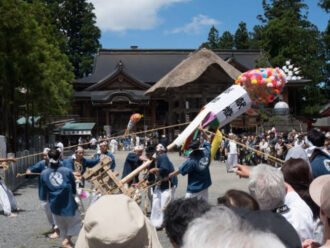 The Brahma Deva gets pulled during the Dewa Sanzan Flower Festival on Mt. Haguro